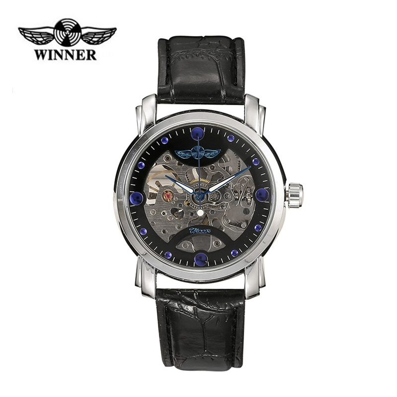 Luxusní černé hodinky s průhledným strojkem s modrými detaily - automatické